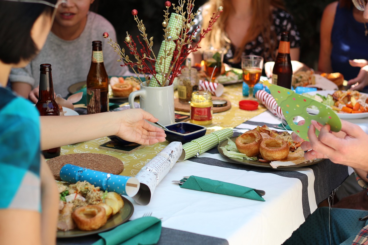 friends gathering around a dinner table 