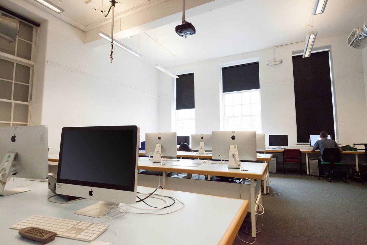 classroom filled with computers