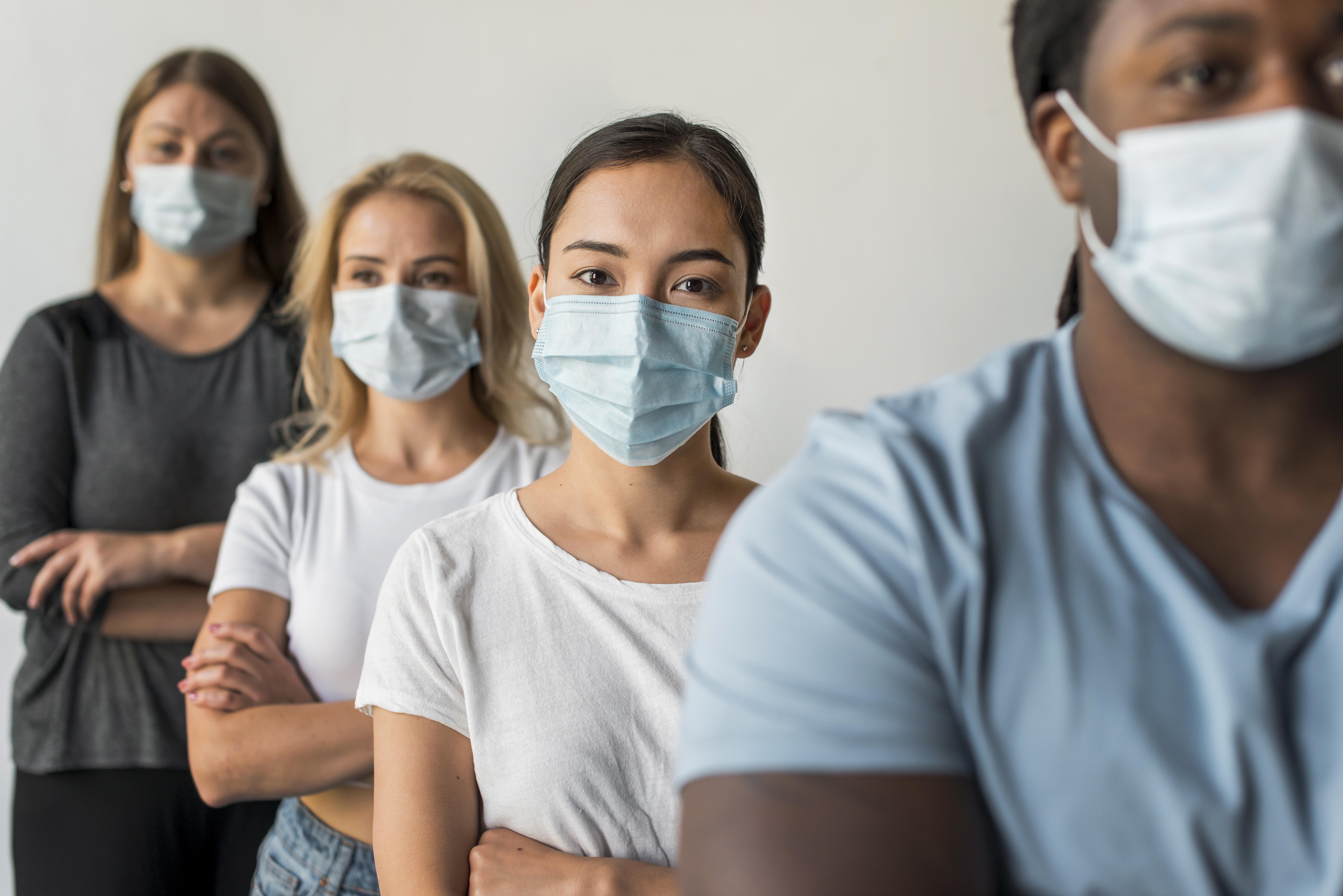 People wearing masks to protect against COVID-19