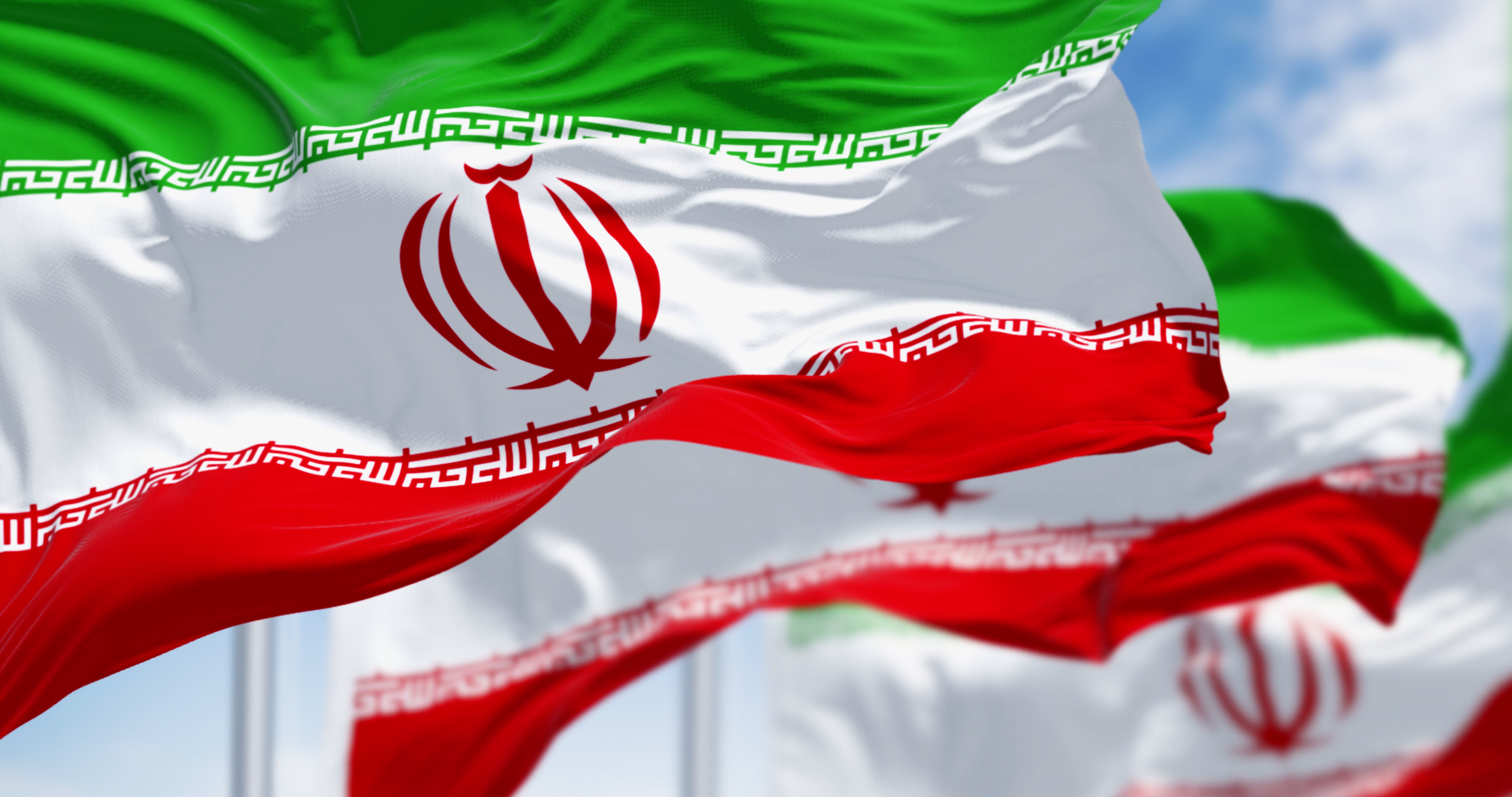 Iranian flag flying in the sky