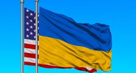 United States Flag and Ukrainian Flag Flying on a Flag Pole