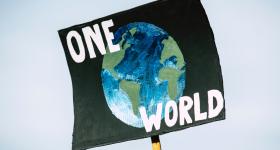 Climate Activism, sign of one world earth 
