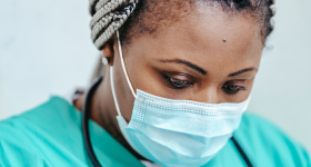 close up of a doctor wearing a mask