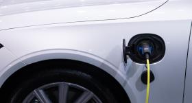 Close up of white electric vehicle charging