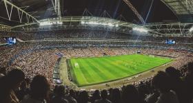 wide view of a soccer stadium filled with fans