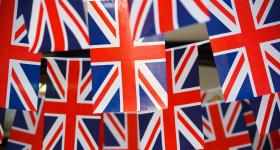 small British flags hanging from string