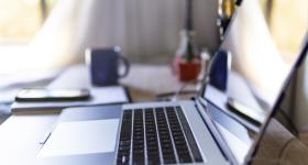 laptop on a desk in a home office