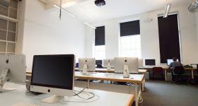 classroom filled with computers