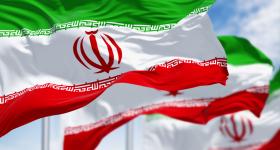 Iranian flag flying in the sky