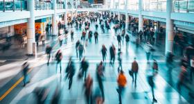 blurred image of people walking in an airport terminal