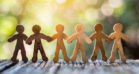 paper people holding hands